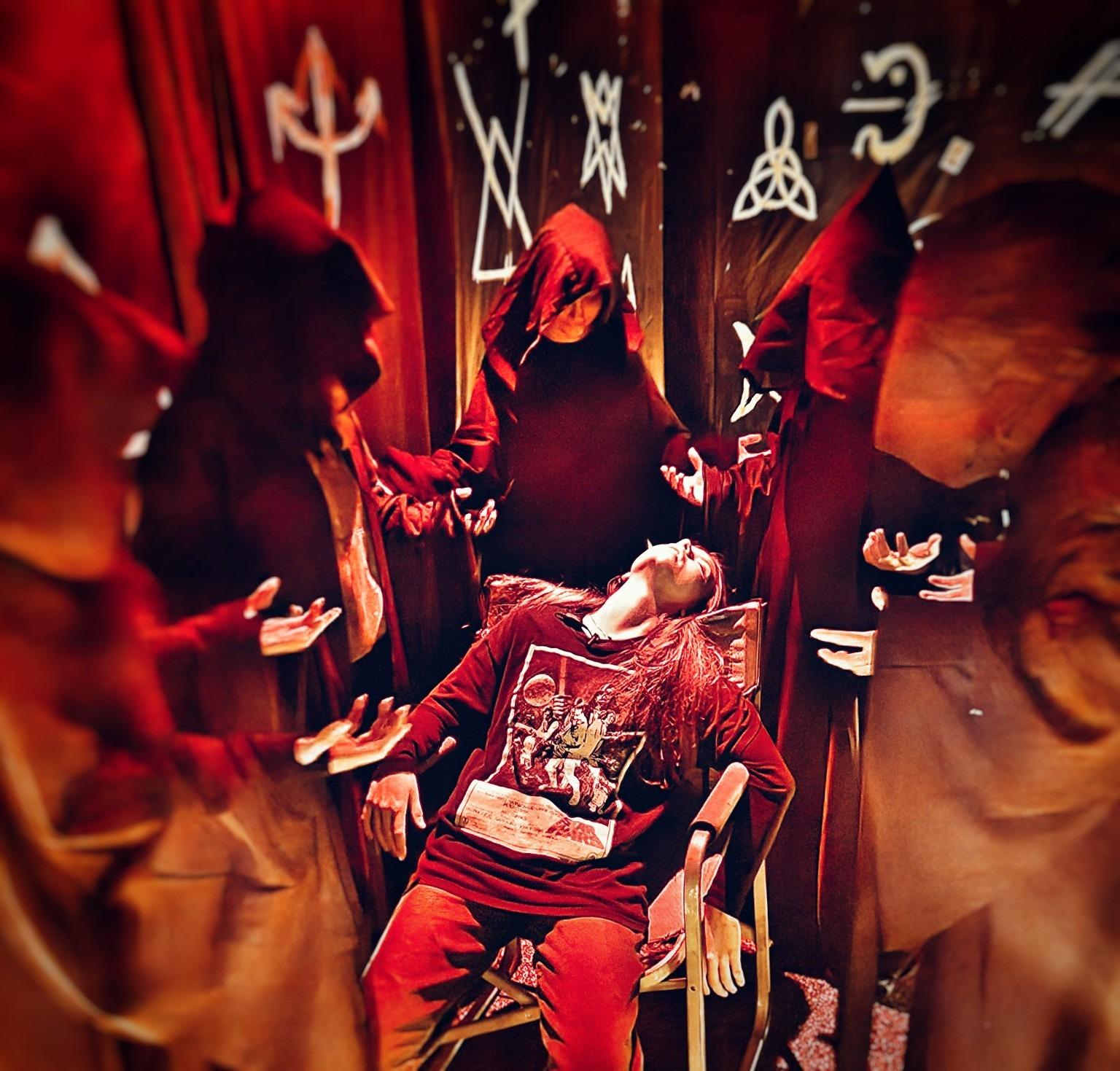 A red lit ritual in progress